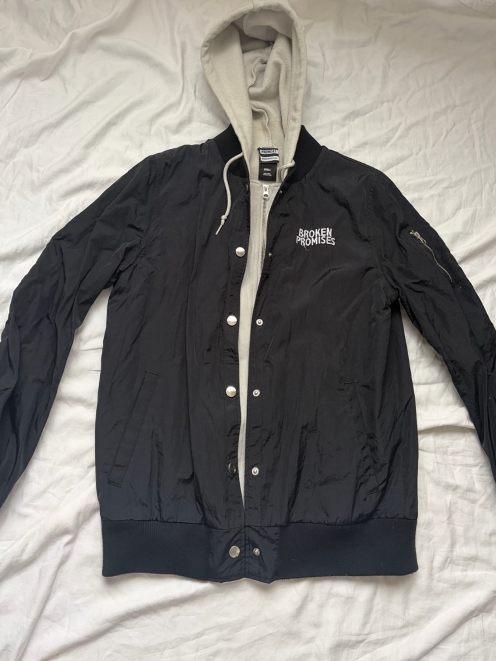 Broken Promises Black Bomber Jacket with Attached Cream Hoodie